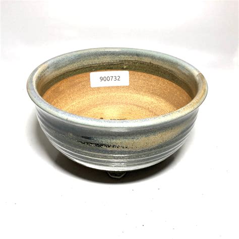 8" diameter All of our products are handmade and therefore subject to slight variations. . Bruning pottery